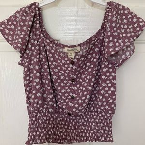 Purple blouse with floral pattern